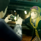 Dazai, one of the game's primary human NPCs, is filmed by his friend before entering a tunnel.
